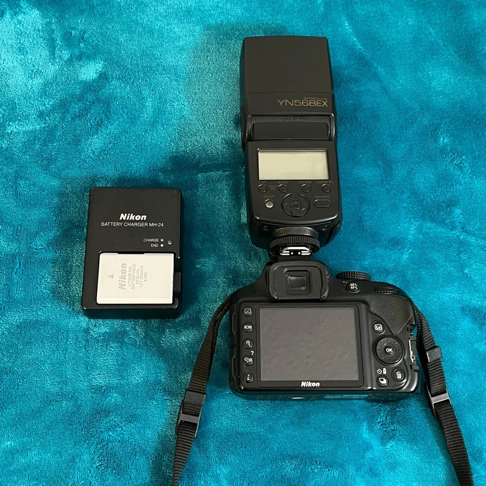 Nikon D3300 DSLR, 3 lenses, and accessories